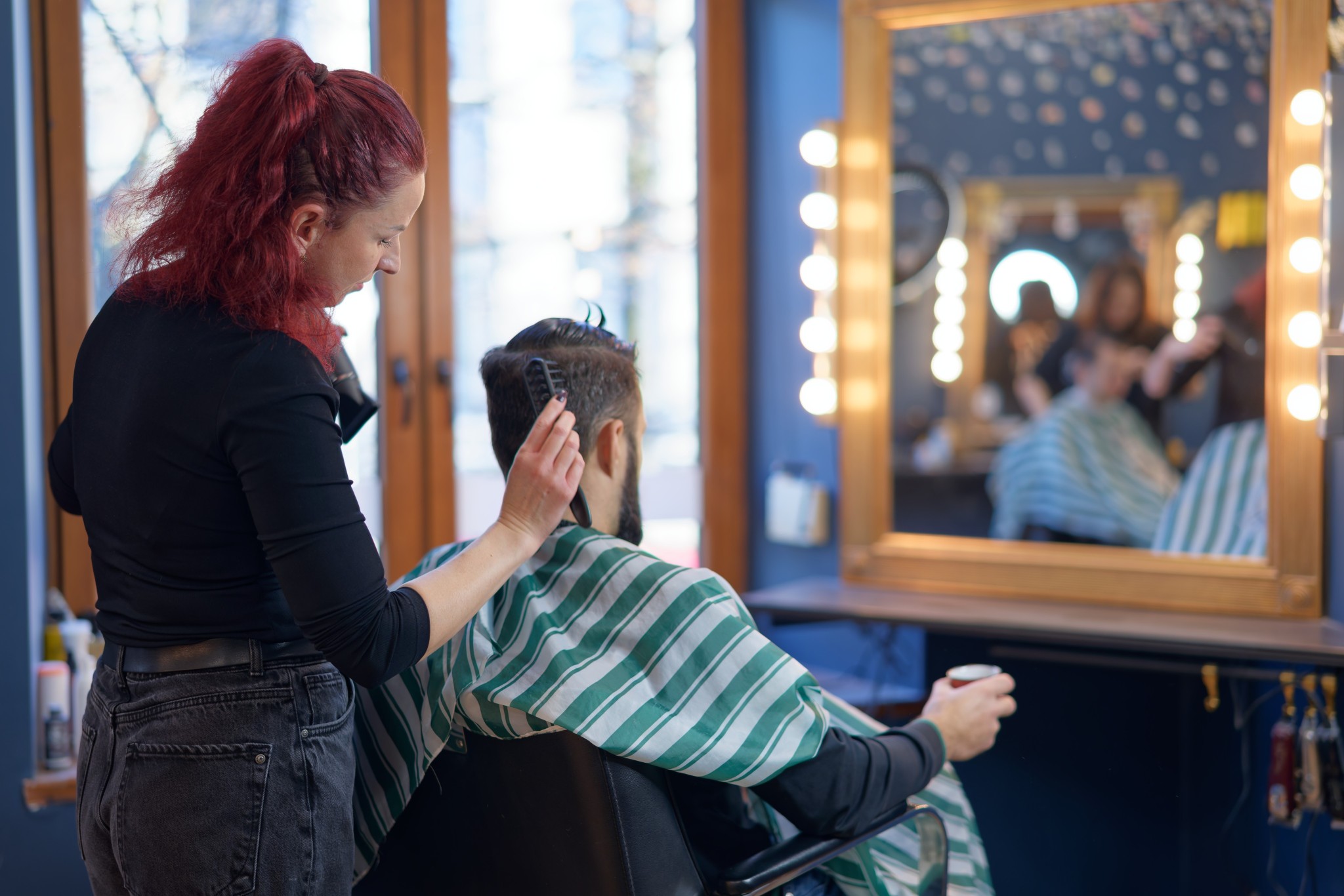 <p>Dapper Damsels Barbershop</p>